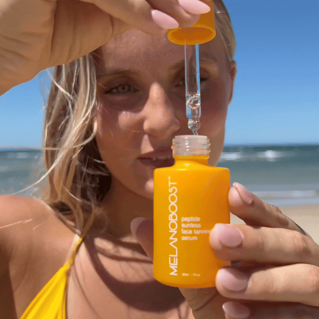 GIF_Tanned_girl_in_yellow_bikini_holding_Melanoboost_Peptide_Sunless_Face_Tanning_Serum_and_dropper_with_a_clear_blue_sky_background