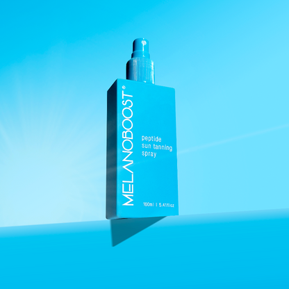 MELANOBOOST_Peptide Sun_Tan_Activator_Spray_on_aqua_background