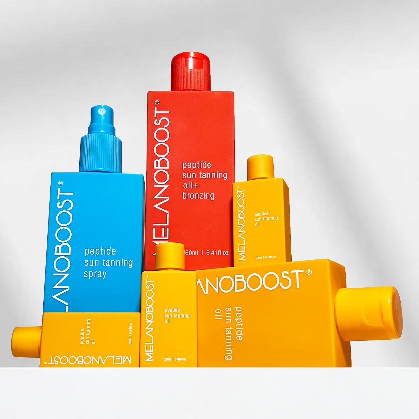 Melanoboost_Peptide_Sun_Tan_Accelerator_Spray_and_Oils_on_a_white_background