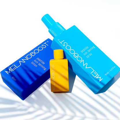 Melanin_Boosting_Duo_Melanoboost_Peptide_Sun_Tan_accelerator_Lotion_and_Spray_bottles_Lying_on_white_background