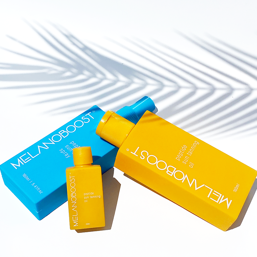 Melanin_Boosting_Duo_Melanoboost_Peptide_Sun_Tan_accelerator_Oil_and_Spray_bottles_Lying_on_white_background